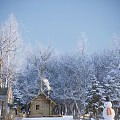 Sauna Cabin In Snowy Forest With Wooden Fence