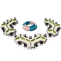 Circular Arrangement Of Modern Office Desks With Central Round Table And Chairs