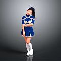 Young Woman In Blue And White Cheerleader Uniform Posing Against Gray Background