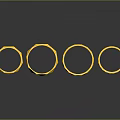 Four Shiny Gold Rings Arranged On Black Background With Reflections