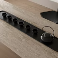 Black Tea Set with Long Tray Six Teacups and Teapot on Light Tabletop