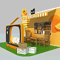 Vibrant Orange TV Shaped Photo Check-in Spot With Perfect Festival Decorations And Green Grass