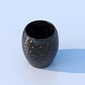 Black Ceramic Vessel With Hammered Texture In Modern Design On Light Blue Background 3d model