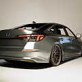 Black Sporty Sedan With Sleek Headlights Alloy Wheels And Red Brake Calipers