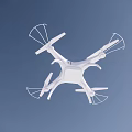 White Modern Drone With Propeller Guards Flying In Blue Sky Background