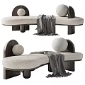 Modern Curved Footstool With Beige Upholstered Seat Wooden Frame Gray Blanket And Round Decorative Balls