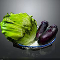 Fresh Green Lettuce And Purple Eggplants In Blue Plate For Healthy Diet