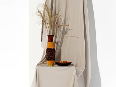Decorative Brown and Yellow Striped Vase With Dried Grasses On Table With Cream Tablecloth 3d model