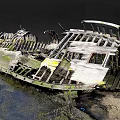 Abandoned Wooden Boat with Rotten Planks and Moss Covered Weathered Wood on Shore