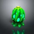 Green Cactus Plant With Blue Spots Yellow Top And Shiny Surface On Dark Background
