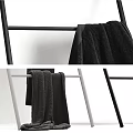 Various Colored Towels Displayed On Racks