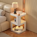 Modern White Bedside Table With Layered Design Lamp Coffee Cup Radio And Books