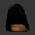 Elegant Black Leather Brogue Shoes With Intricate Carving And Brown Sole