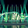 Stage Design With Green Lights Arches Steps And Silhouette Of Person