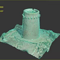 Ancient Stone Cylindrical Tower With Earth Toned Exterior Sandy Base And Green Vegetation