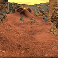 Red Sandstone Canyon Landscape With Rock Formations Sandy Ground And Natural Arch