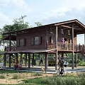Wooden Two Story Guesthouse Building With Balcony And Lush Green Surroundings