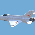 White Military Fighter Jet With Red Emblems Flying In Blue Sky