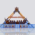 Pirate Ship Amusement Ride With Blue Railings Stairs And Decorative Structure