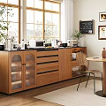 Wooden Sideboard With Glass Doors And Kitchen Appliances In Bright Modern Dining Space