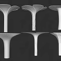 Six White Modern Columns Featuring Unique Top Shapes And Textured Patterns