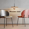 Modern Silver And Pink Leather Dining Chairs With Black Metal Legs In Minimalist Interior