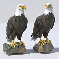 Two Bald Eagles Standing on Rocky Surfaces with White Heads and Yellow Talons