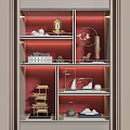 Multi Tiered Shelf Display Of Decorative Ornaments With Red Background Buddha Statue Tea Set Pagoda