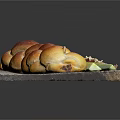 Fresh Braided Bread Served with Ham Walnuts and Cucumber Sticks on Wooden Board