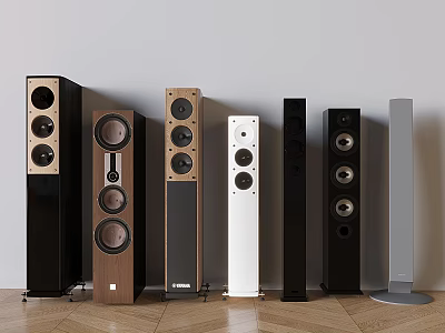 Various Design Floor Standing Speakers With Wooden And Metal Finishes Arranged Against White Wall 3d model