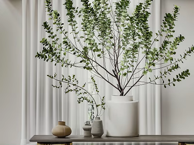 White Vase With Green Foliage On Table With Curtain Background And Small Decorative Vases 3d model