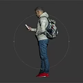 A man wearing hoodie and jeans using phone with backpack on gray background