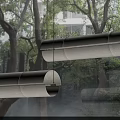 Modern Cylindrical Pendant Light With Glowing Strip Against Natural Tree Background Space