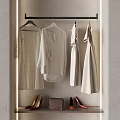 Minimalist White Clothes Hanging On Rack With High Heels And Handbag