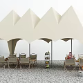 Stylish Outdoor Tables Under Beige Tent Canopy With Chairs Plants And Fruit Crates