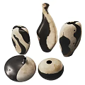 Artistic Black And White Ceramic Vessels With Unique Textured Shapes For Home Decor