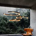 Contemporary Ring Design Chandelier with Warm Lighting and Lush Forest View in Interior
