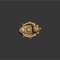 Golden Decorative Object With M A S H Inscription And Intricate Design Details