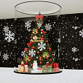 Christmas Themed Window Display With Decorated Tree Snowflakes Gifts And Merry Christmas Sign