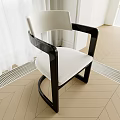 Modern Single Chair With Black Armrests And Beige Fabric Seat On Wooden Herringbone Floor