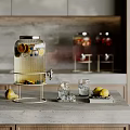 Refreshing Fruit Infused Beverage In Glass Dispenser With Lemon Slices Pear And Ice Cubes