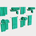 Green Towels Displayed As Hanging Rolled And Folded On Metal Racks