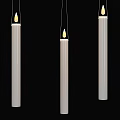 White Cylindrical Chandeliers Hanging In Black Background With Slim Elongated Design And Bottom Light Sources