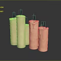 Beige Cylindrical Decorative Candles With Wax Drips On Dark Surface