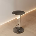 Contemporary Round Accent Table with Polished Metal Frame and Clear Glass Top in Stylish Interior