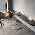 Modern Black Desk with Transparent Chairs Silver Dog Ornament Moon Shaped Lamp and Grey Wall
