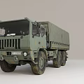 Military Off Road Cargo Truck With Green Canvas Covered Bed And Multiple Wheels