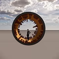 Illuminated Circular Landscape Sculpture With City Skyline Silhouettes And Person In Urban Park