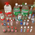 Assorted Bottled Drinks and Water Bottles on Wooden Table with Green Plants and Red Fruits