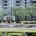 Residential Landscape with Modern Apartment Building Lush Trees Green Lawn and Recreational Space